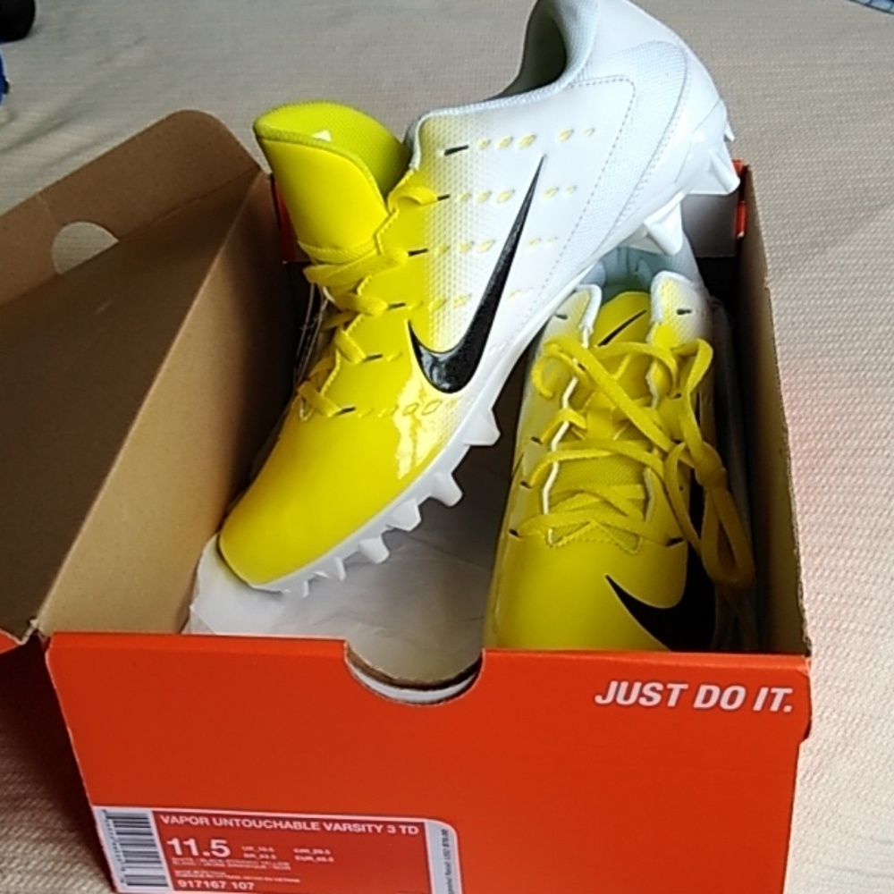 Nike untouchable varsity cleats size  11.5